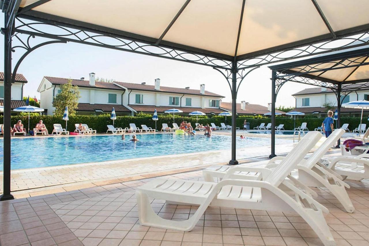 Terraced House In The Ca' Del Pino Holiday Complex With Communal Pool In 비비오네 외부 사진